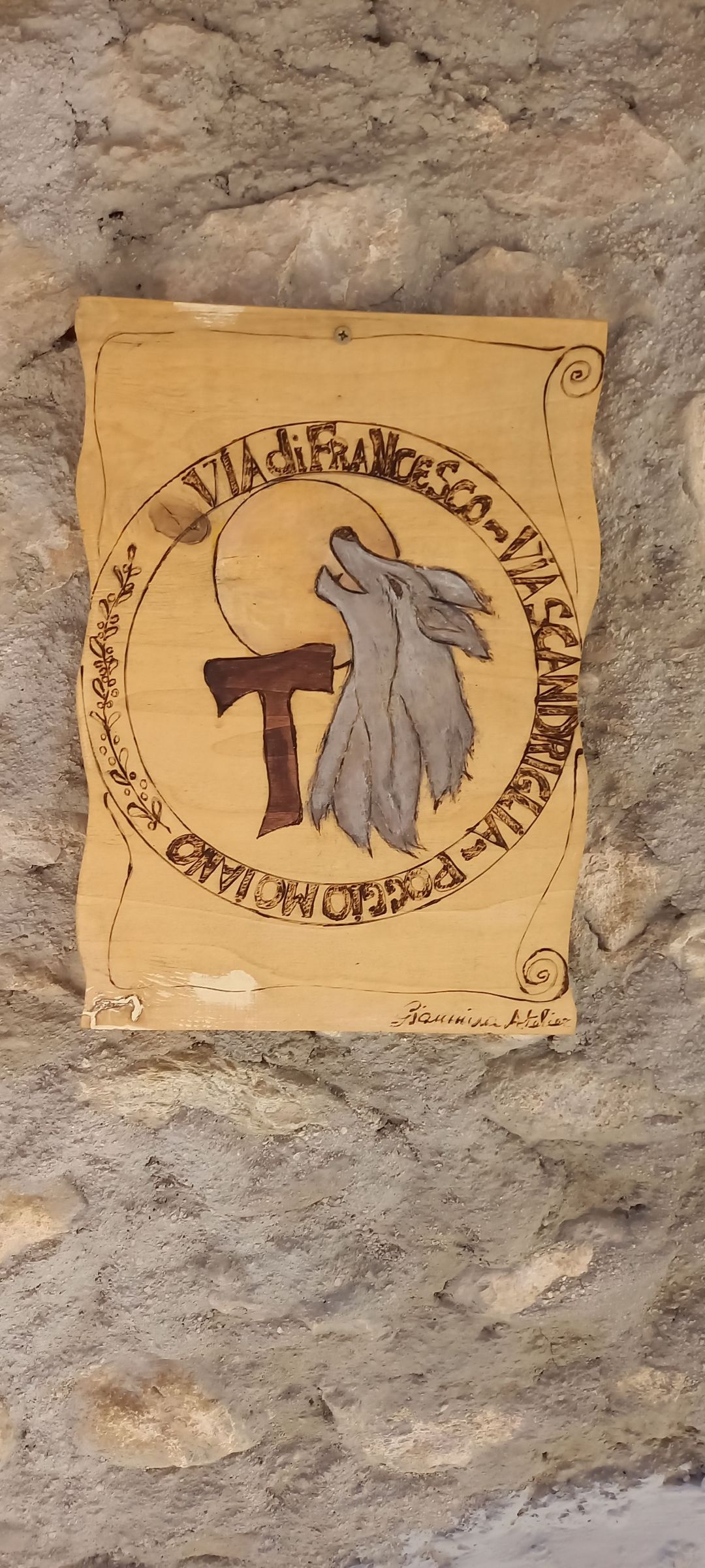 Wolf und Franziskuskreuz